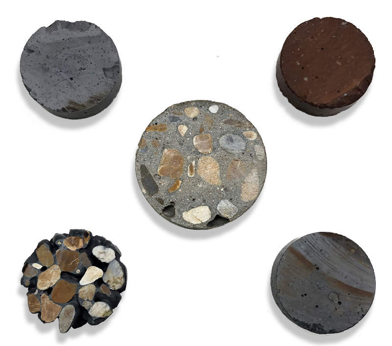 Photo of five samples of geopolymer materials indifferent colors and rock compositions.